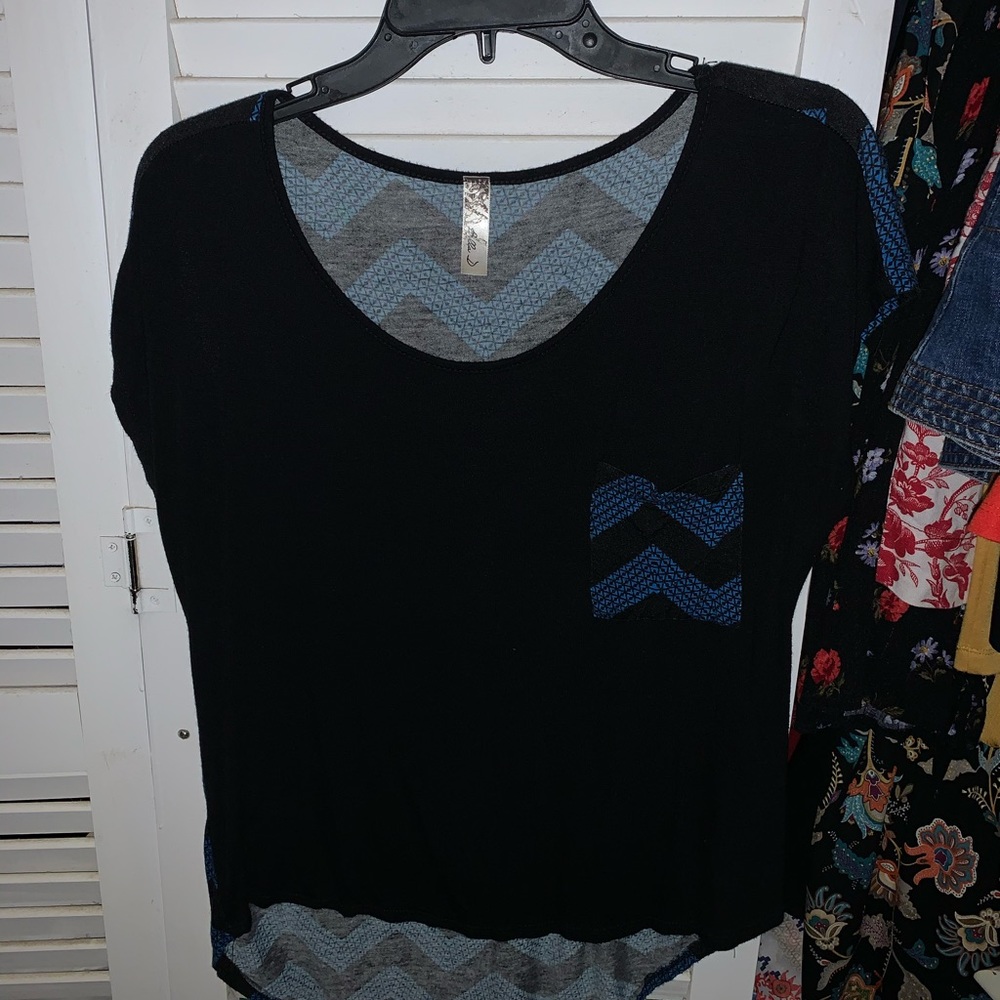 Cute “Bella D” brand shirt. Gently used.